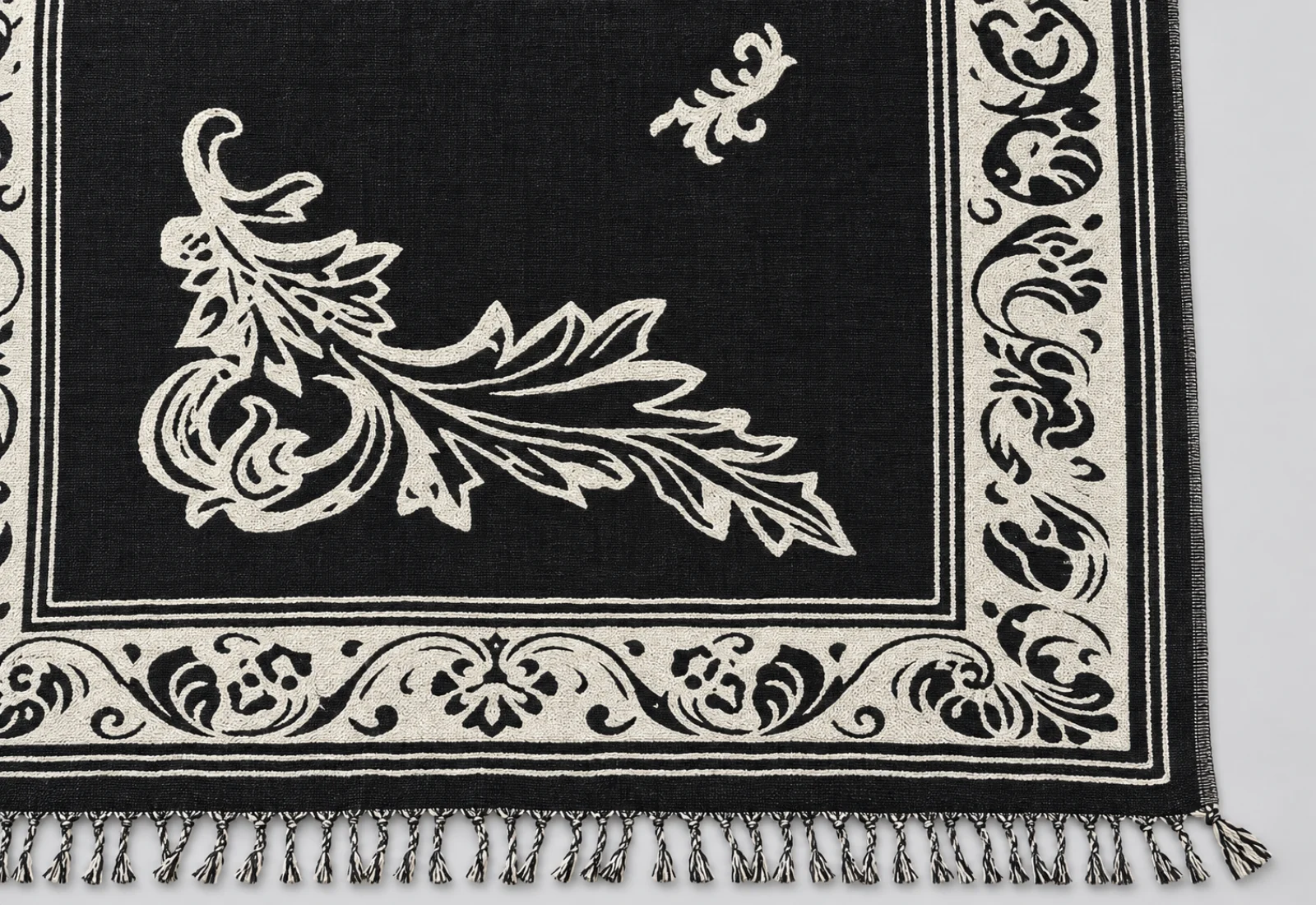 Black and ivory botanical jacquard weave detail